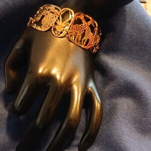 Wild Bryde Goldtone African Animal Cutout Bracelet. 7 &1/4 Inch